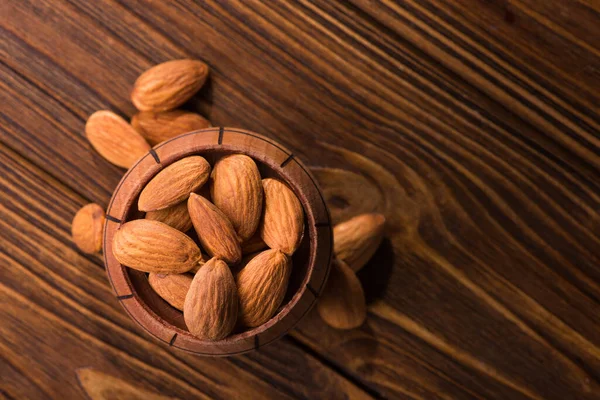Raw Almonds Wooden Barrel Table Angle — Stock Photo, Image
