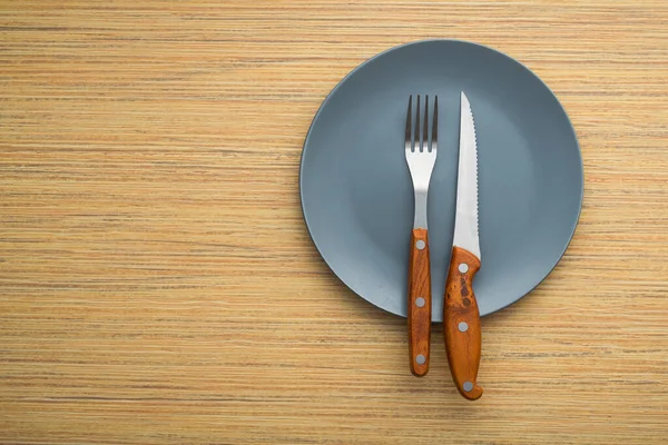 Tenedor Metal Cuchillo Una Mesa Madera Disposición Cubiertos Después Las —  Fotos de Stock