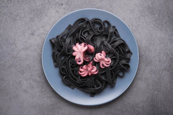 Italian Black Pasta Cuttlefish Ink Marinated Octopus Plate Stone Table — Stock Photo, Image