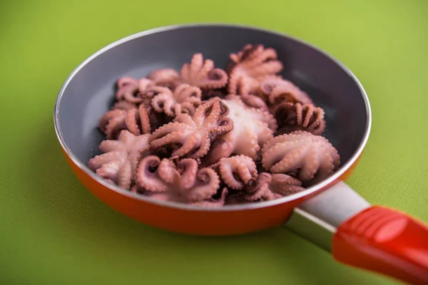 Small Pickled Octopus Red Frying Pan Asian Food Green Background — Stock Photo, Image