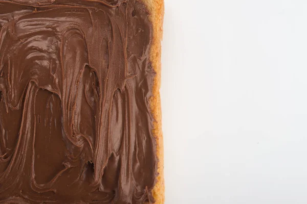 Toast with chocolate isolated on a white background. high-calorie food