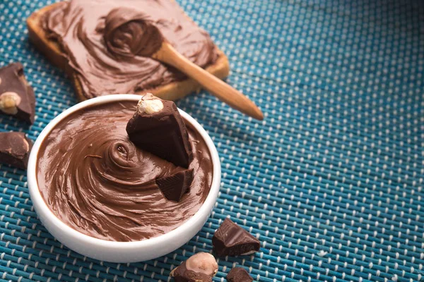 Cuenco Con Sabroso Chocolate Derretido Una Mesa Madera Azul —  Fotos de Stock