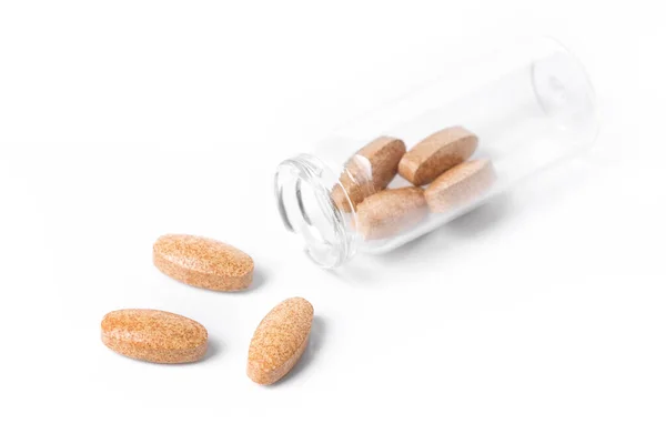 Medizinische Pillen Einem Glasbehälter Isoliert Auf Weißem Hintergrund — Stockfoto