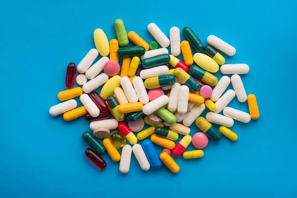 Many Colored Pills Capsules Blue Background — Stock Photo, Image