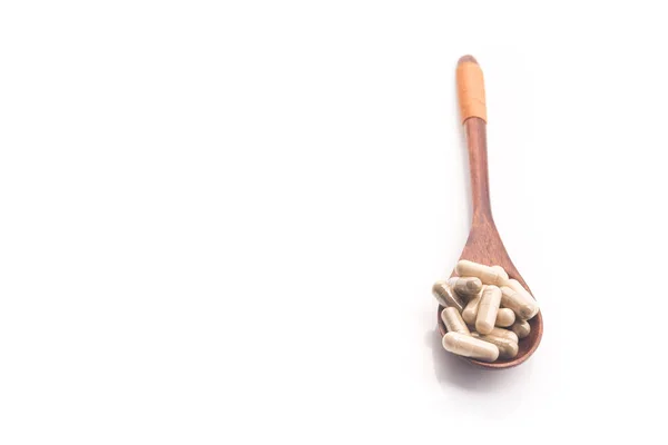 Orvosi Gyógynövény Kapszula Kanállal Elszigetelt Fehér Természetes Vitamin Adalékanyag Tabletták — Stock Fotó