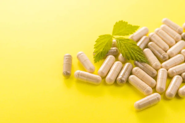 Herbal Medical Capsule Yellow Background Natural Vitamin Supplements Food — Stock Photo, Image