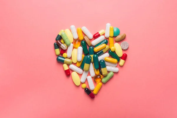 Colored Heart Made Tablets Pills Pink Pastel Background Top View — Stock Photo, Image