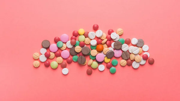 Pile Colored Pills Capsule Tablets Pastel Pink Background Top View — Stock Photo, Image
