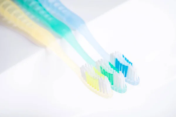 Closeup Toothbrush Sink White Background Teeth Cleaning Hygiene — Stock Photo, Image