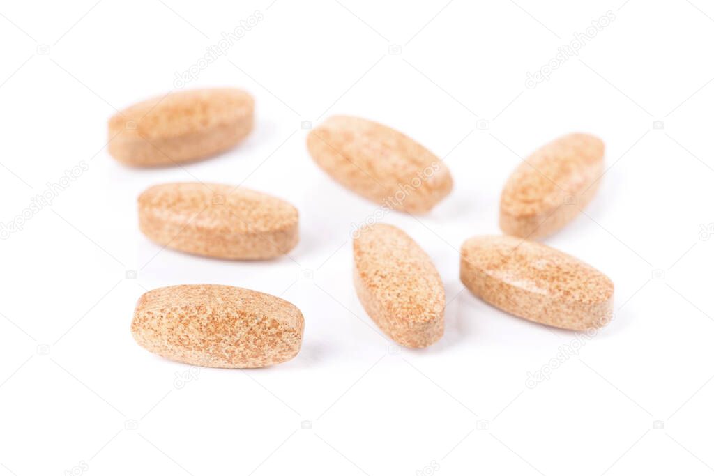 Herbal medical pills isolated on a white background