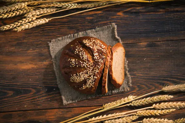 Tasty Rye Bread Sesame Wooden Background Top View — Stock Photo, Image