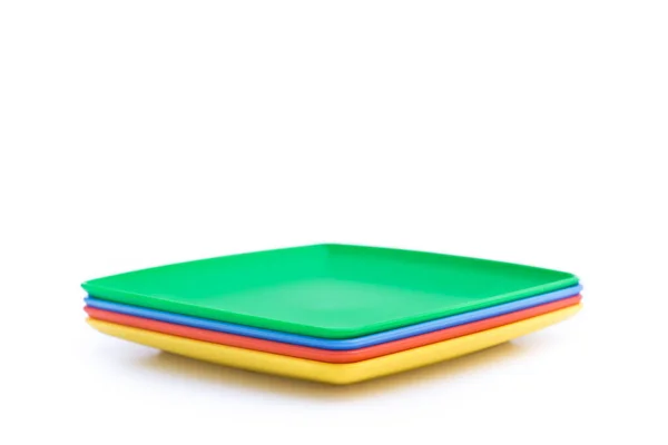 Colored Plastic Plates Green Blue Red Yellow Isolated White Background — Stock Photo, Image