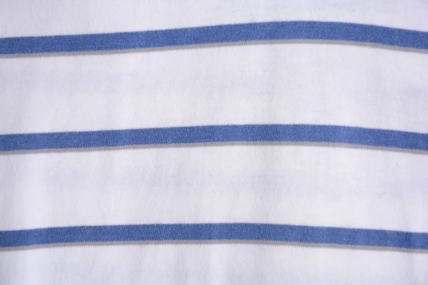 Texture background of striped vintage shirt. Blue and white stripe