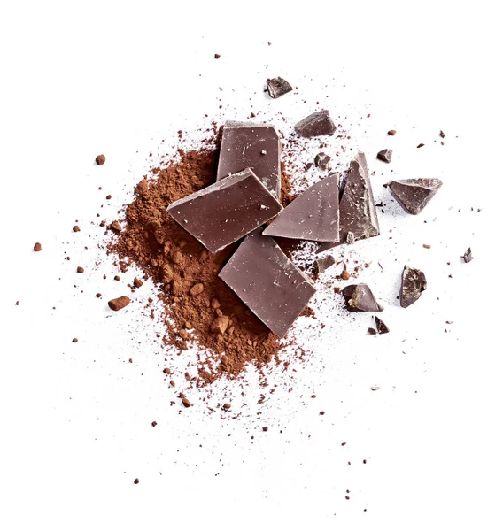 Kakaopulver Und Stücke Dunkler Schokolade Isoliert Auf Weißem Hintergrund Kuchenzutaten lizenzfreie Stockfotos