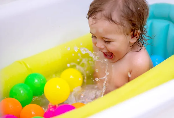 Cute Happy Little Boy Bathing Child Tub Splashes Water Enjoys — стоковое фото