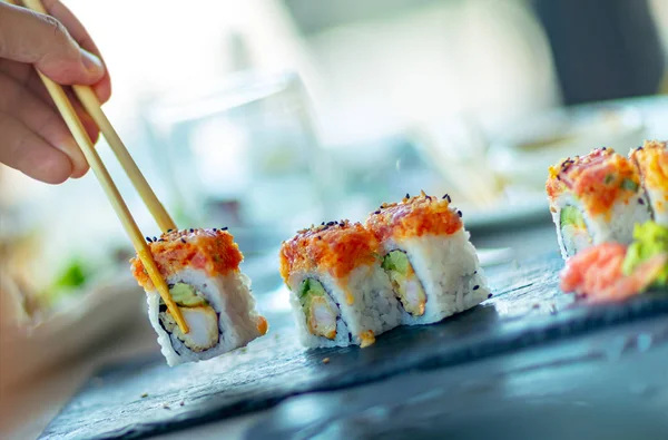 Enjoying sushi — Stock Photo, Image