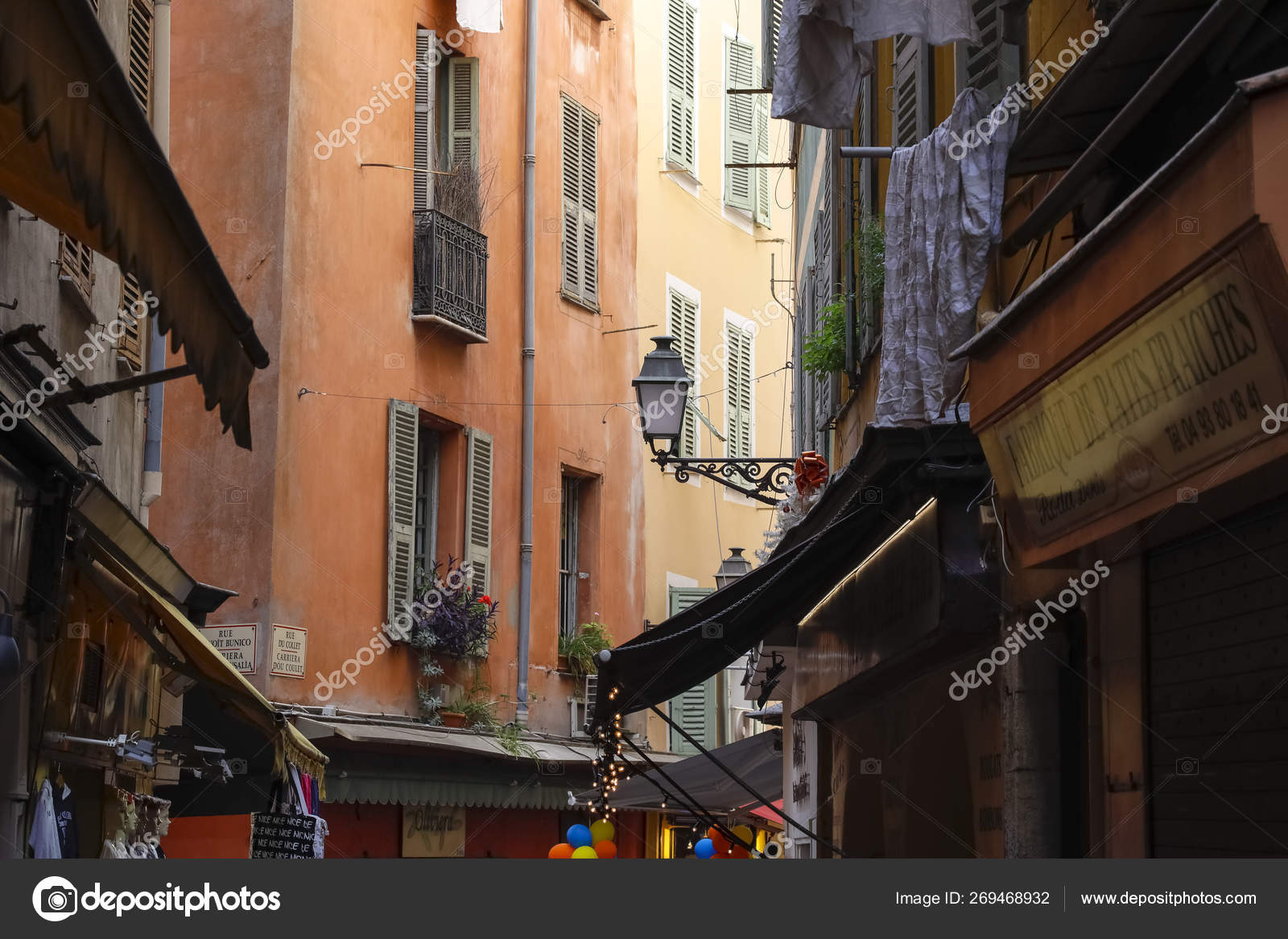 Old Nice As You Can See It Above The Shop Windows Foto