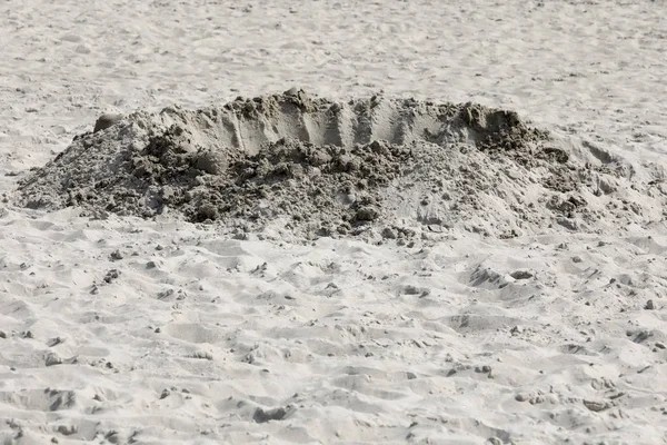 A sand castle that failed