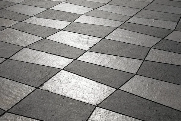 Sunlight painted on a mosaic pavement — Stock Photo, Image