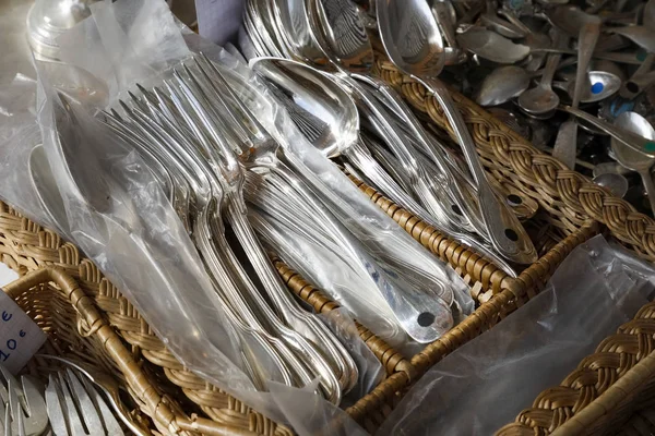 Used cutlery on display for sale — Stock Photo, Image