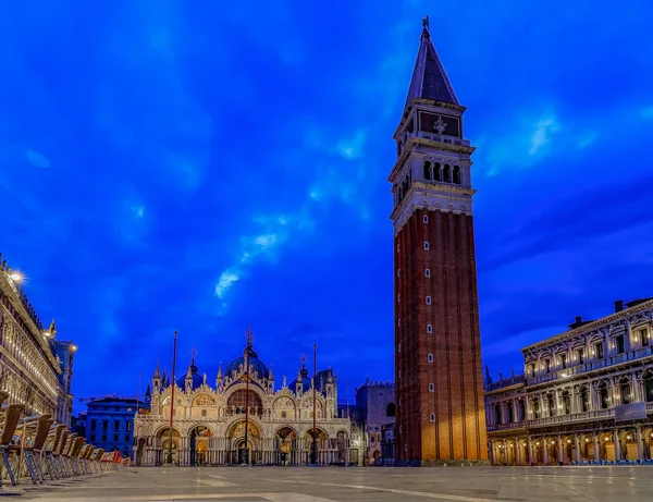 Saint Mark\'s (San Marco) square, main square of Venice, Italy with the  Campanile and Saint Mark\'s Basilica at sunrise