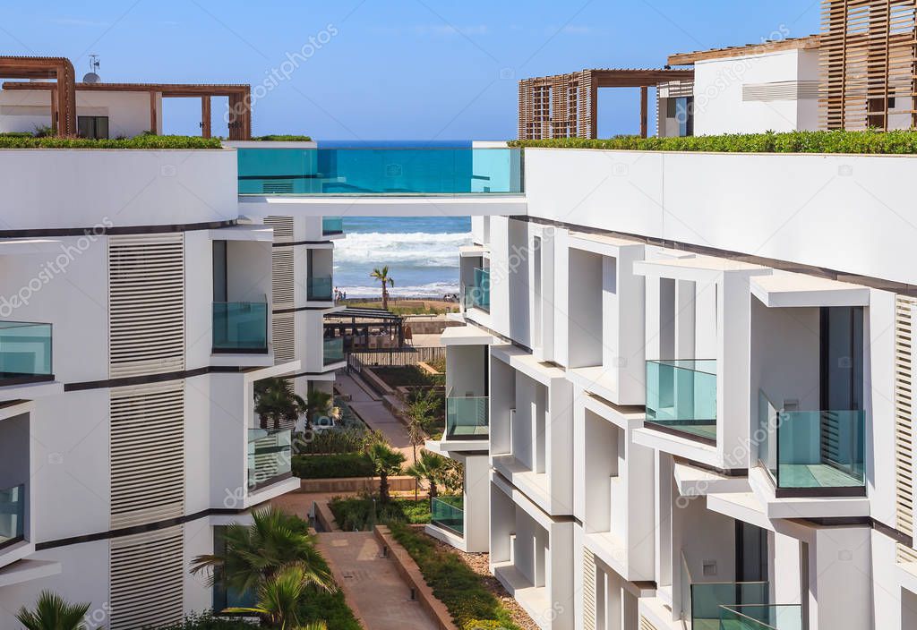 View of oceanfront modern luxury apartment buildings in Casablanca, Morocco