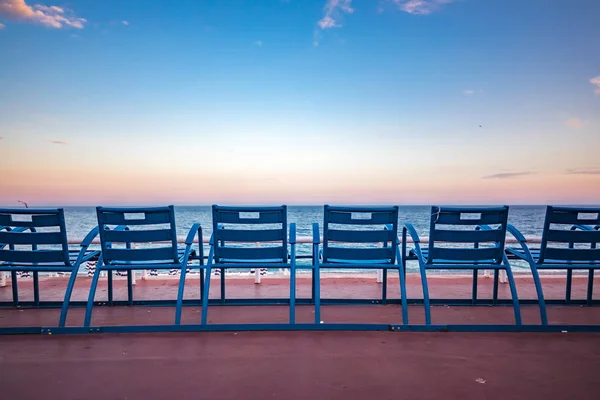 Blue chairs on the Promenade des Anglais in Nice France — Stock Photo, Image