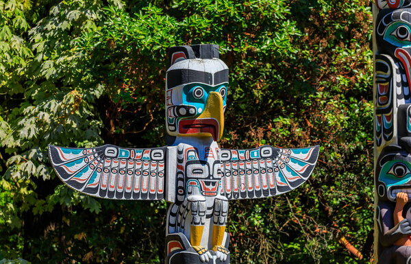 First Nations American Indian thunderbird totem pole at Brockton Point in Stanley Park in Vancouver, Canada