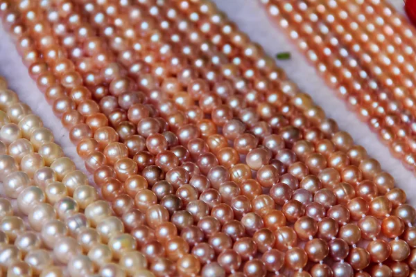 Strings of pearls at the tourist market in Gulangyu Island in China