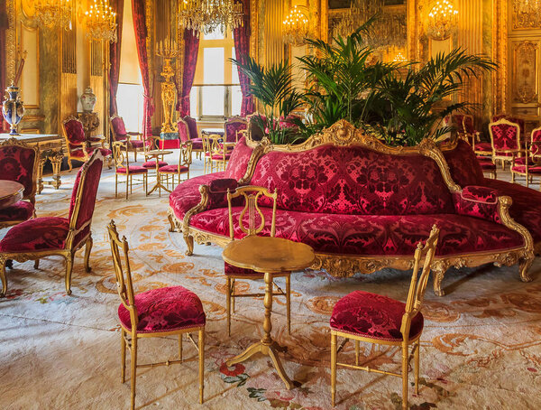 Paris, France - October 25, 2013: Interior of the apartments of Napoleon III in Louvre Museum with luxury baroque furnishings and stunning chandeliers
