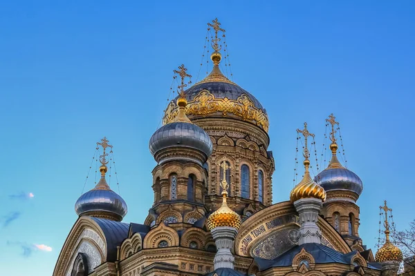 Ornate golden domes and crosses of the Russian Orthodox Church o