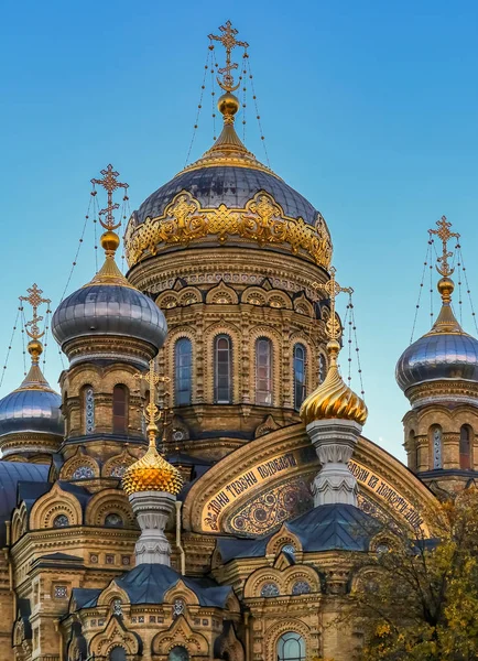 Ornate golden domes and crosses of the Russian Orthodox Church o