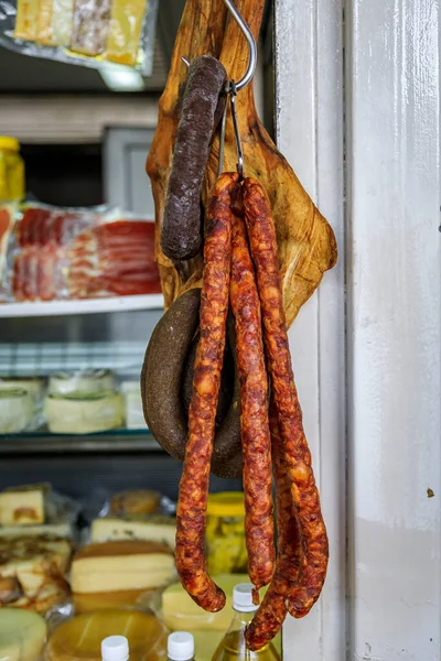 Selection Cheeses Display Sausages Hanging Stall Outdoor Farmer Market Old — Stock Photo, Image