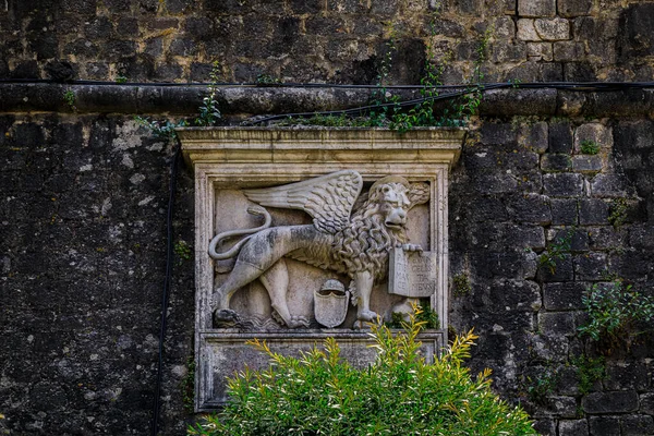 Winged Lion of Venice on Kotor city wall, former Venetian fortress in Montenegro. Latin words on the book Pax tibi, Marce, evangelista meus mean Peace unto you, Mark, my Evangelist