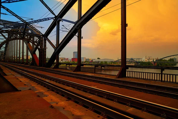 Berlin railway at Deutschherrnbrucke bridge over river Meno in Germany