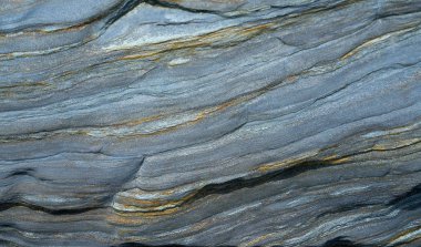 Slate stone texture in Playa las catedrales Ribadeo Galicia Spain clipart