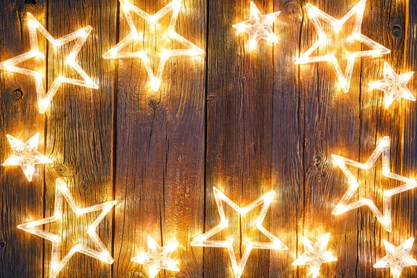 Christmas Glowing Stars Vintage Wooden Background Copy Space — Stock Photo, Image