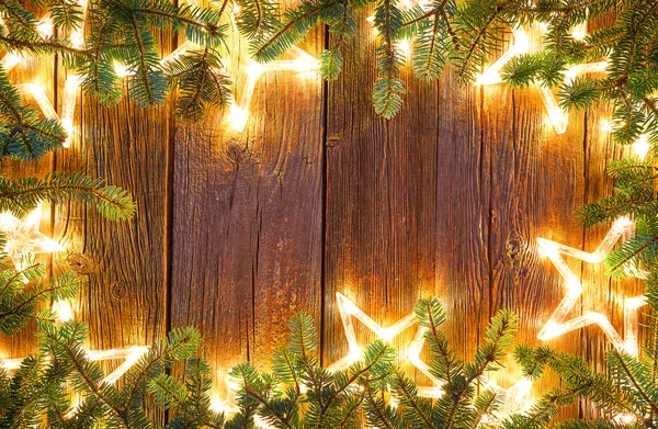 Christmas Glowing Stars Fir Vintage Wooden Background Copy Space — Stock Photo, Image