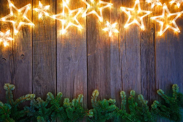 Vánoční Svítící Hvězdy Jedle Vinobraní Dřevěné Pozadí Kopírovat Prostor — Stock fotografie