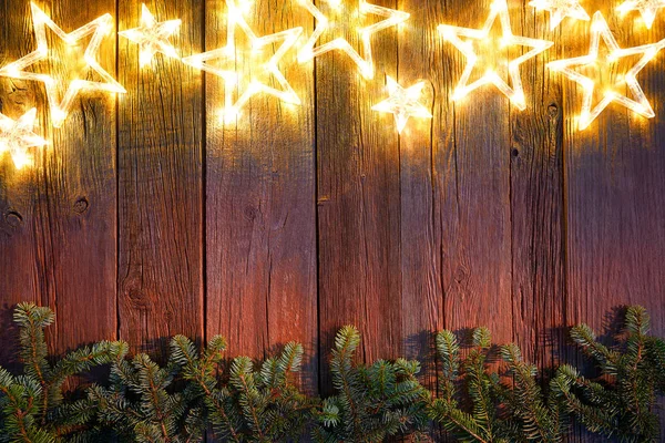 Natale Stelle Incandescenti Abete Sfondo Legno Vintage Copia Spazio — Foto Stock