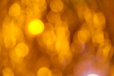 Altın fişek ışıkları sarı arka plan bulanıklık