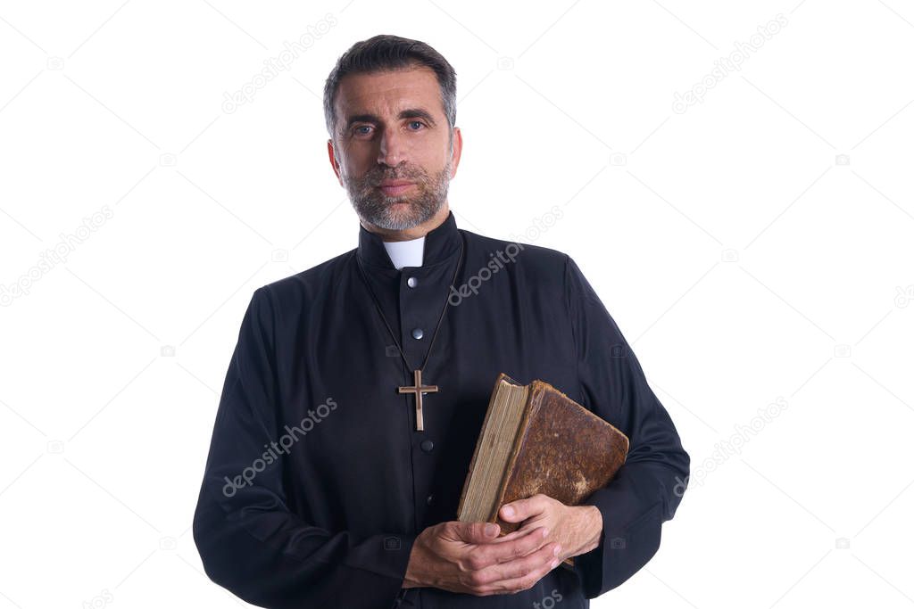 Priest portrait with Holy Bible in hands isolated on white