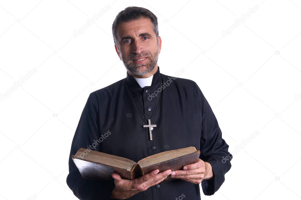 Priest portrait with Holy Bible in hands isolated