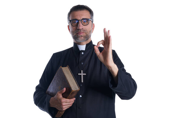 Priest with ok finger hands sign on isolated white background