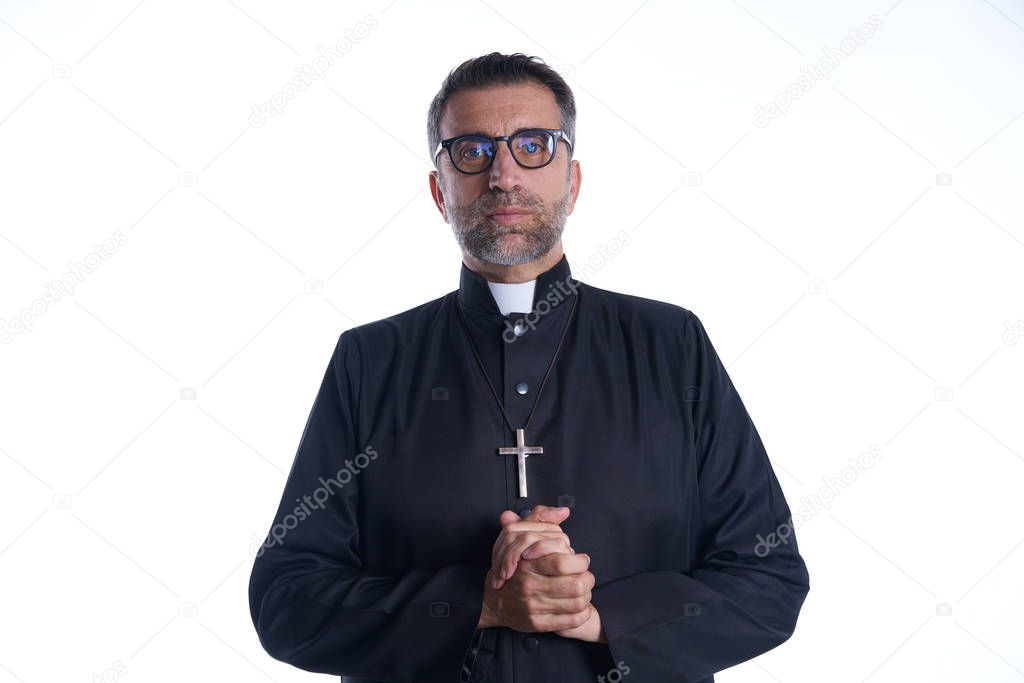 Priest pastor portrait praying hands relaxed