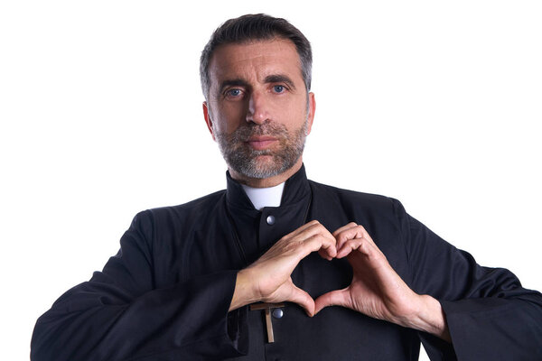 Priest man doing a heart shape with fingers gesture expression