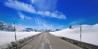 Baqueira Beret road in Lerida Catalonia ski  resort in Aran Valley of Pyrenees Spain clipart