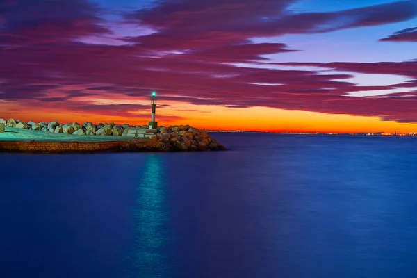 アリカンテ フエルタス桟橋スペインの夕暮れ光をビーコンします — ストック写真
