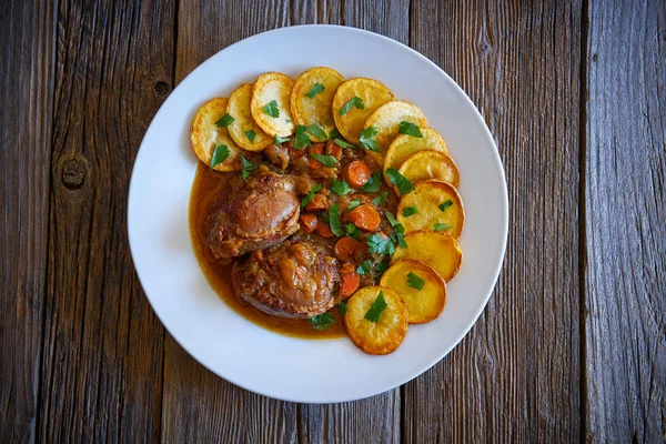 pig cheek recipe on wooden table board