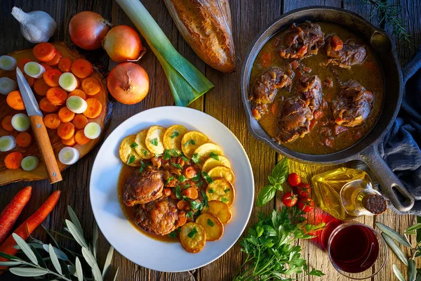 pig cheek recipe on wooden table board